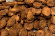 Harley’s Treats USA paw-print biscuits, baked and ready to bag