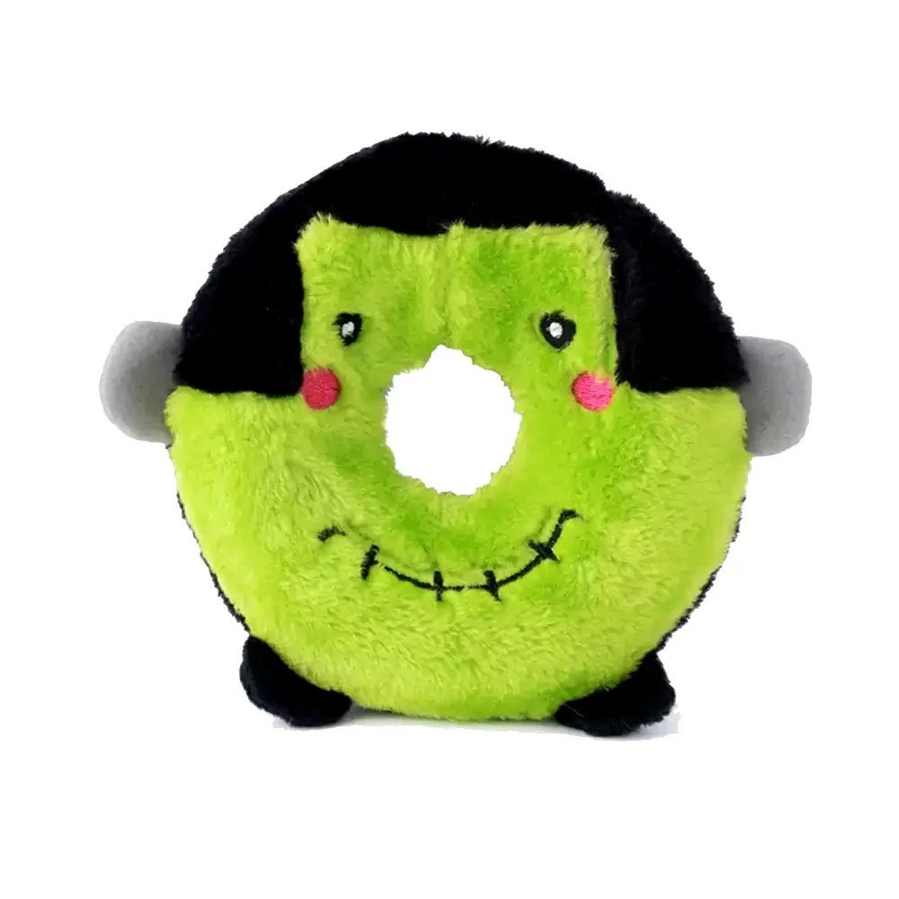 Green and black monster-face donut plush dog toy